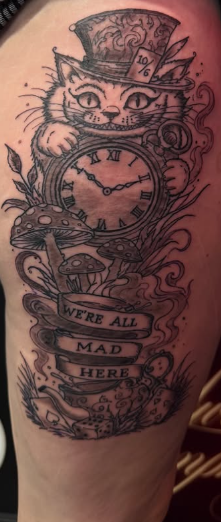 Fine-line illustrative Cheshire cat perched on a pocket watch with mushrooms and banner text.